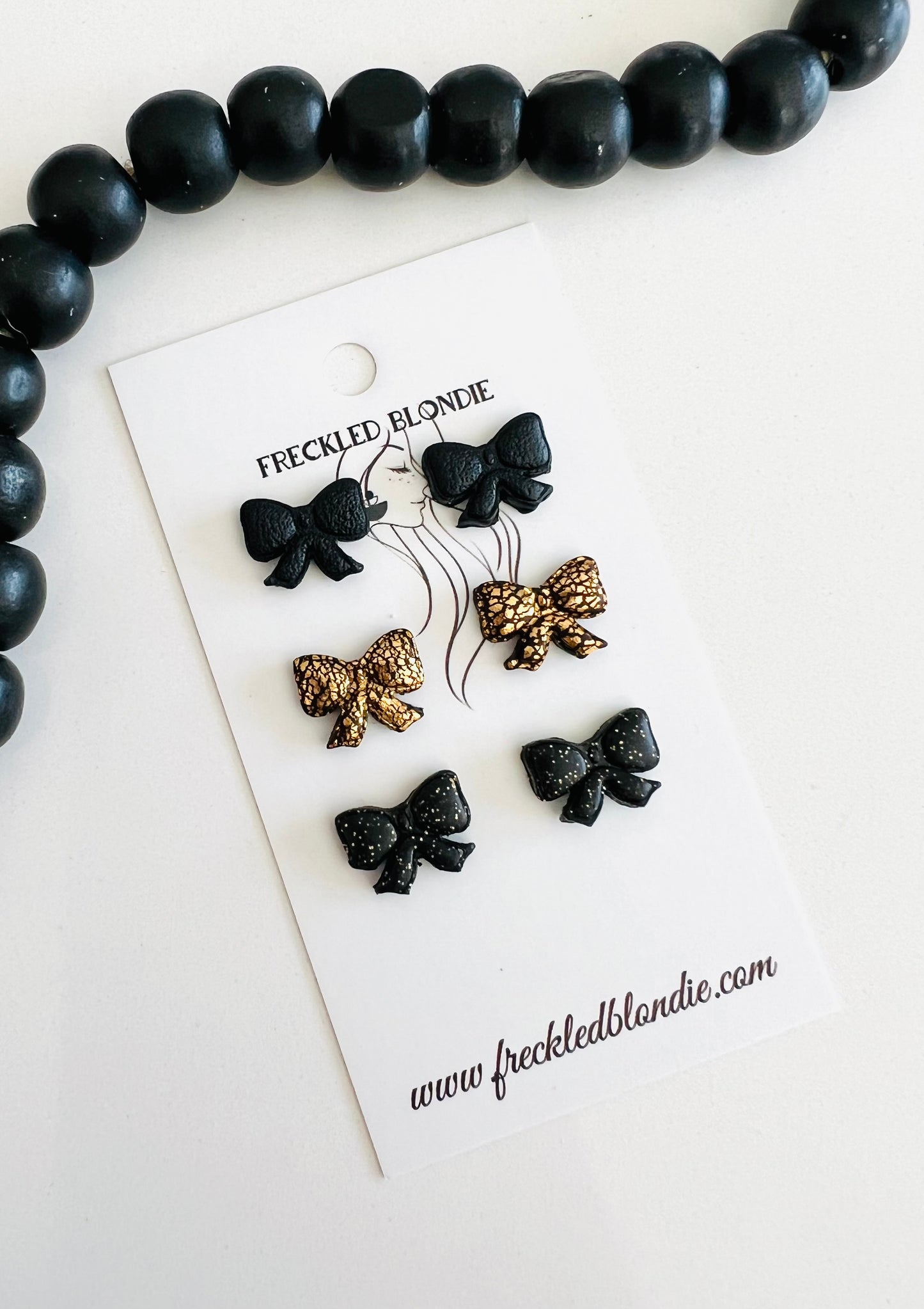 Black & Gold Bow Stud Pack