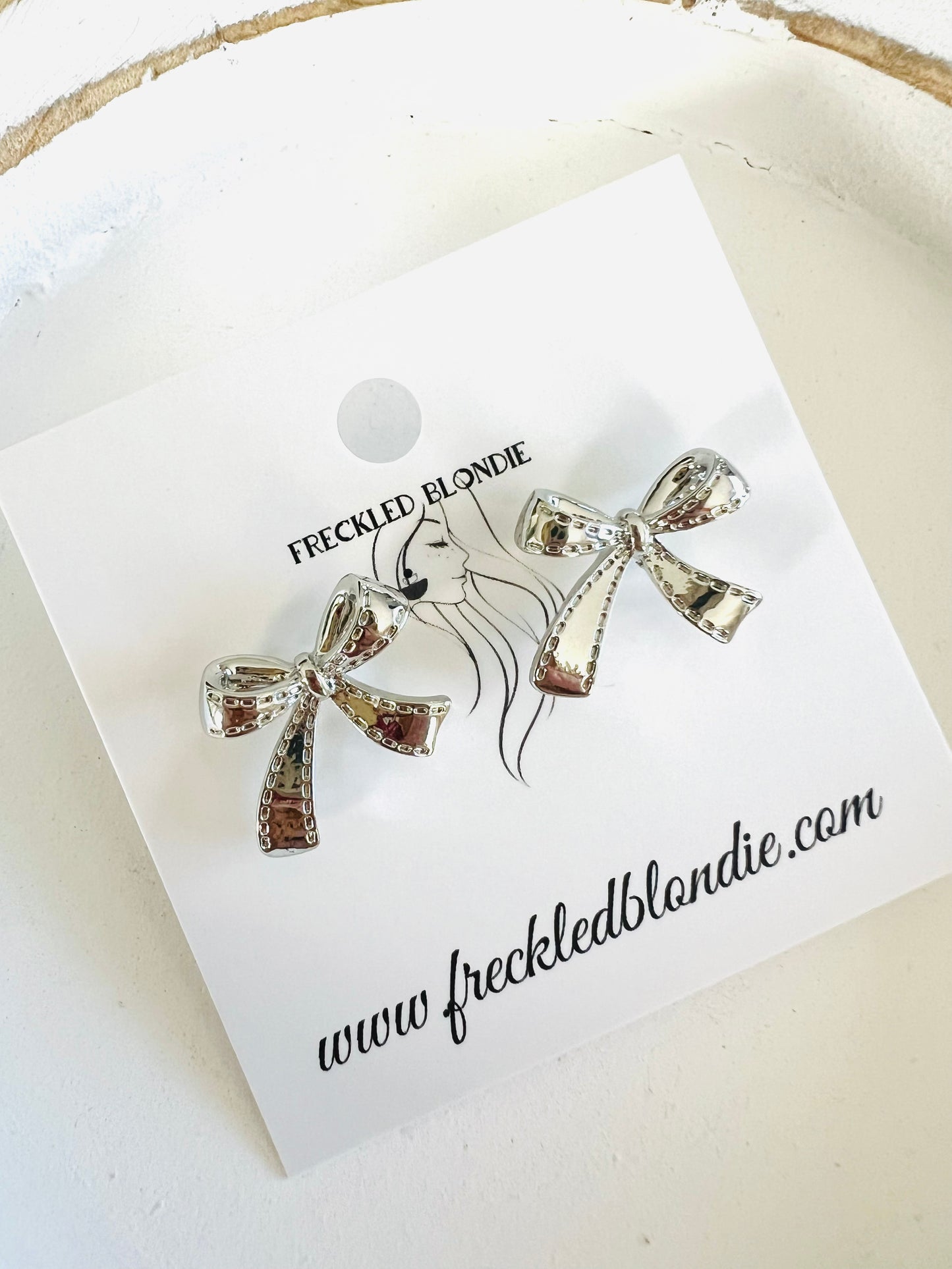 Silver Knotted Bow Studs