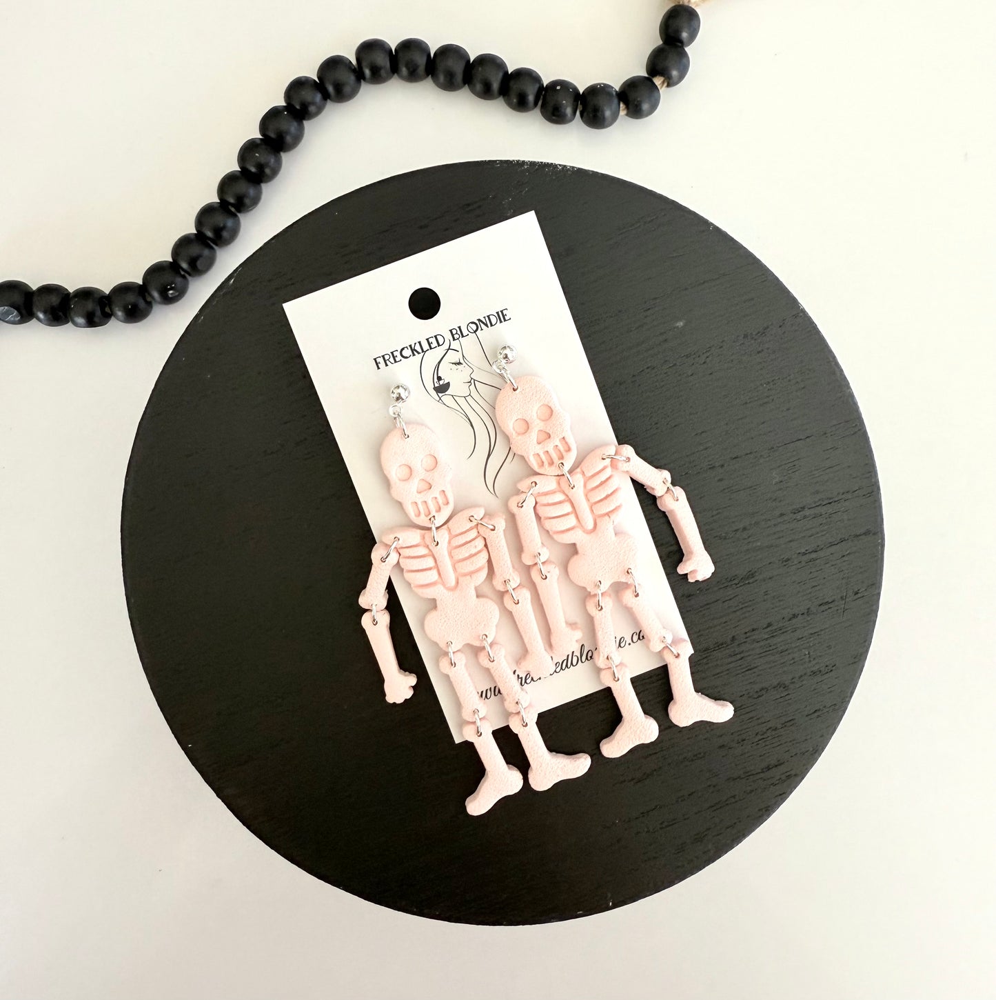 Light Pink Skelly Dangles